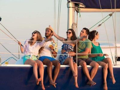 A group of tourists taking a photo on the cruise
