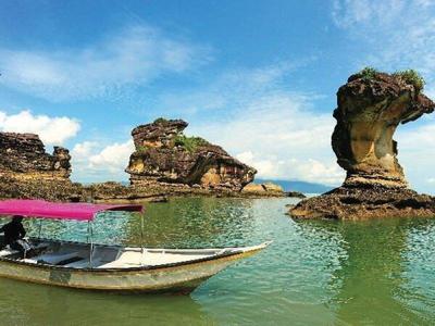 A longboat and stone structures in the Bako National Park
