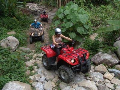 ATV riding near Song Preak River