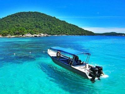 Boat on the ocean in Perhentian
