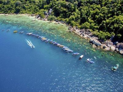 Boats dock in a line at Perhentian