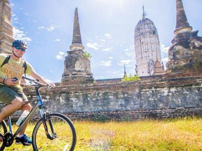 Cycling tourists at Ayutthaya historical city