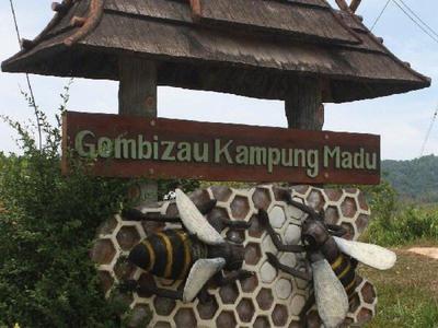 Entrance sign for Gombizau Kampung Madu in Kudat