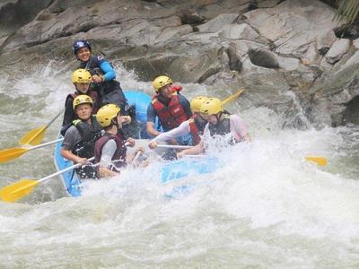 Group team building on white water rafting adventure activity