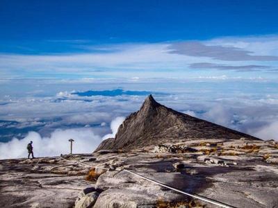 Hiker at the top of Mount Kinabalu