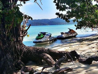 Jetski in a shade under a tree at Langkawi Island