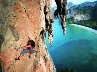 Lady rock climbing at Krabi Island