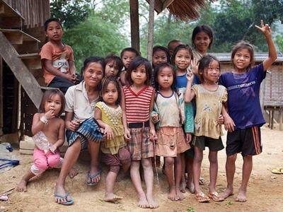 Laos villagers and kids posing for a picture