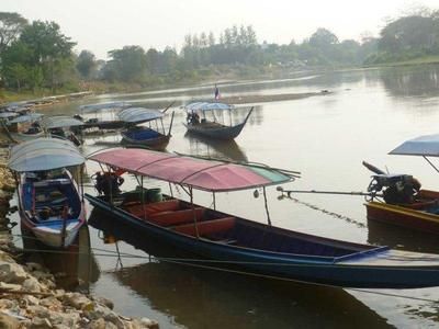 Longboat by the river in Chiang Rai