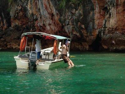 Make tourist going into the sea at Pulau Payar
