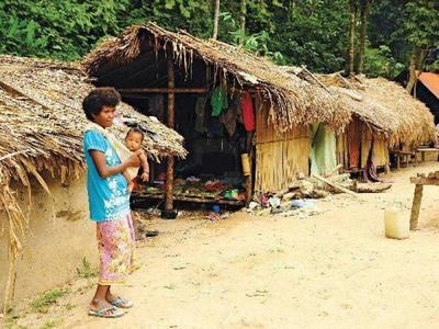Native tribe living in a village in Taman Negara