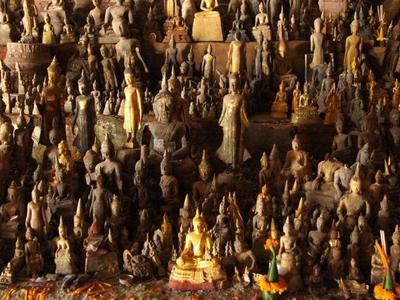 Numerous Buddha statues in Pak Ou Caves