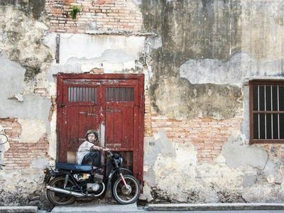 Street art on an unused door in Georgetown
