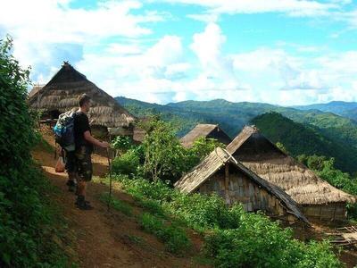 Tourist exploring the native village in Laos