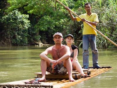 Tourist on a bamboo raft in Chiang Mai