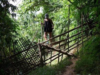 Tourist trekking on a trail in Luang Prabang