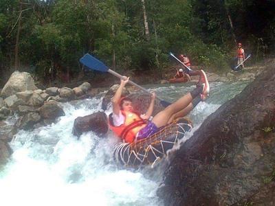 Tourists tubing at a river in Endau Rompin National Park