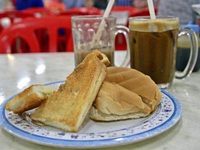 Traditional toasts and iced coffee for breakfast at Imbi Market