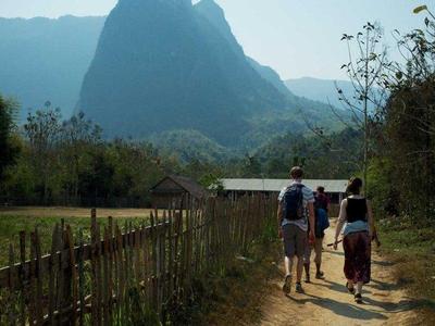 Trekking through villages in Laos