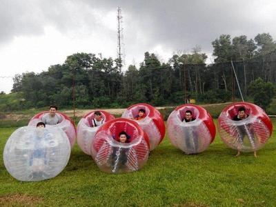 Visitors wearing bubble balls in Ola Park
