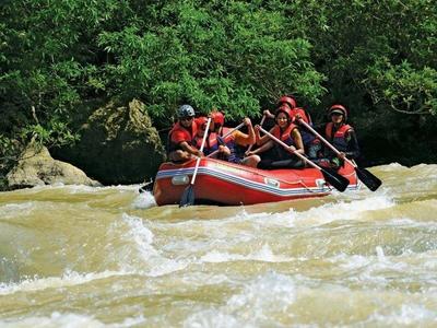 Water rafting along the river at Jeram Besu