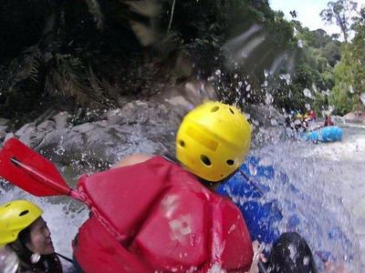 Wet white water rafting on Kampar River